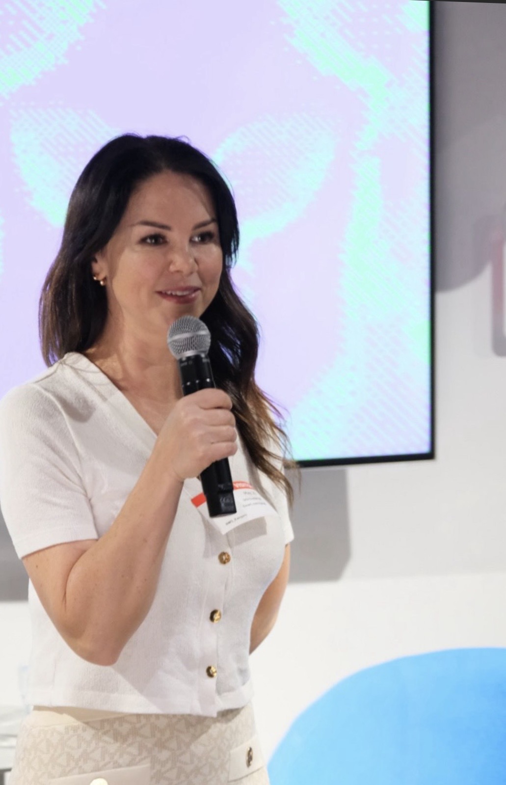 Olga Saboureau speaking at an industry event